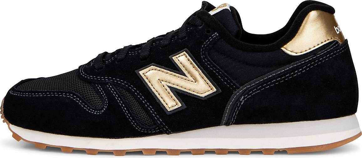 New balance 373 store schwarz gold