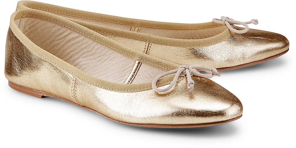 gold ballerinas
